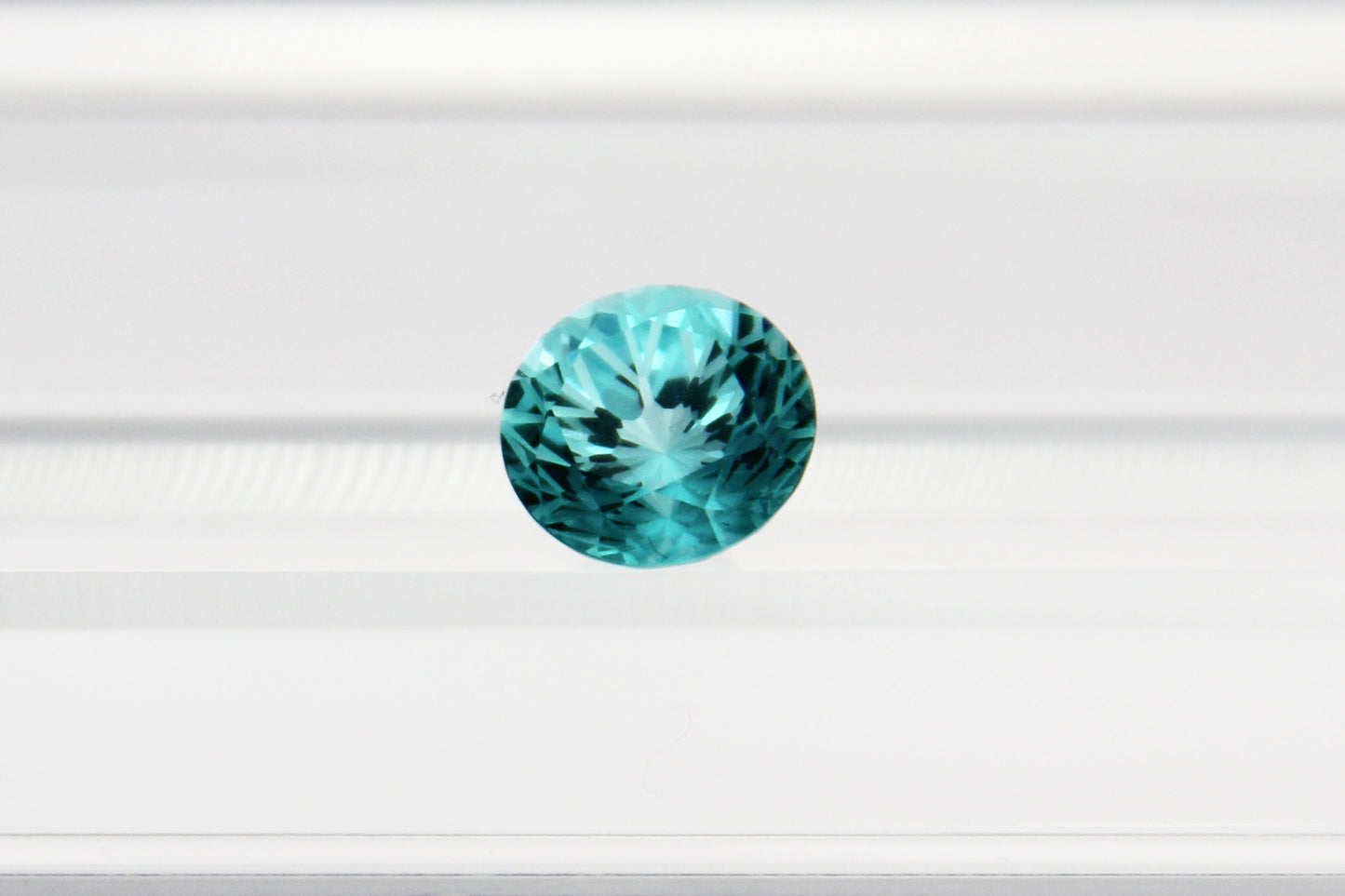 Swallowtail-style Round Cut Paraiba-color Lab-grown Garnet